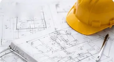 Engineering drawings and a hard hat
